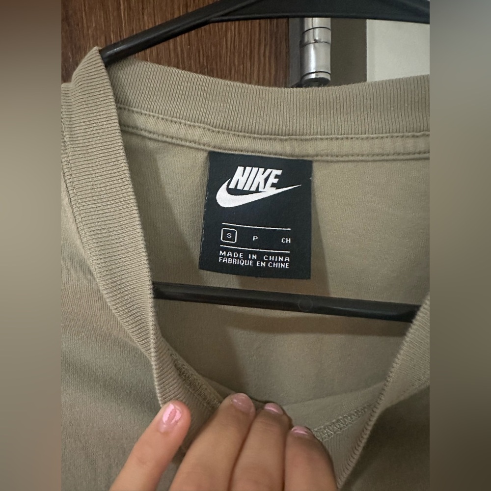 Nike army green colored top.